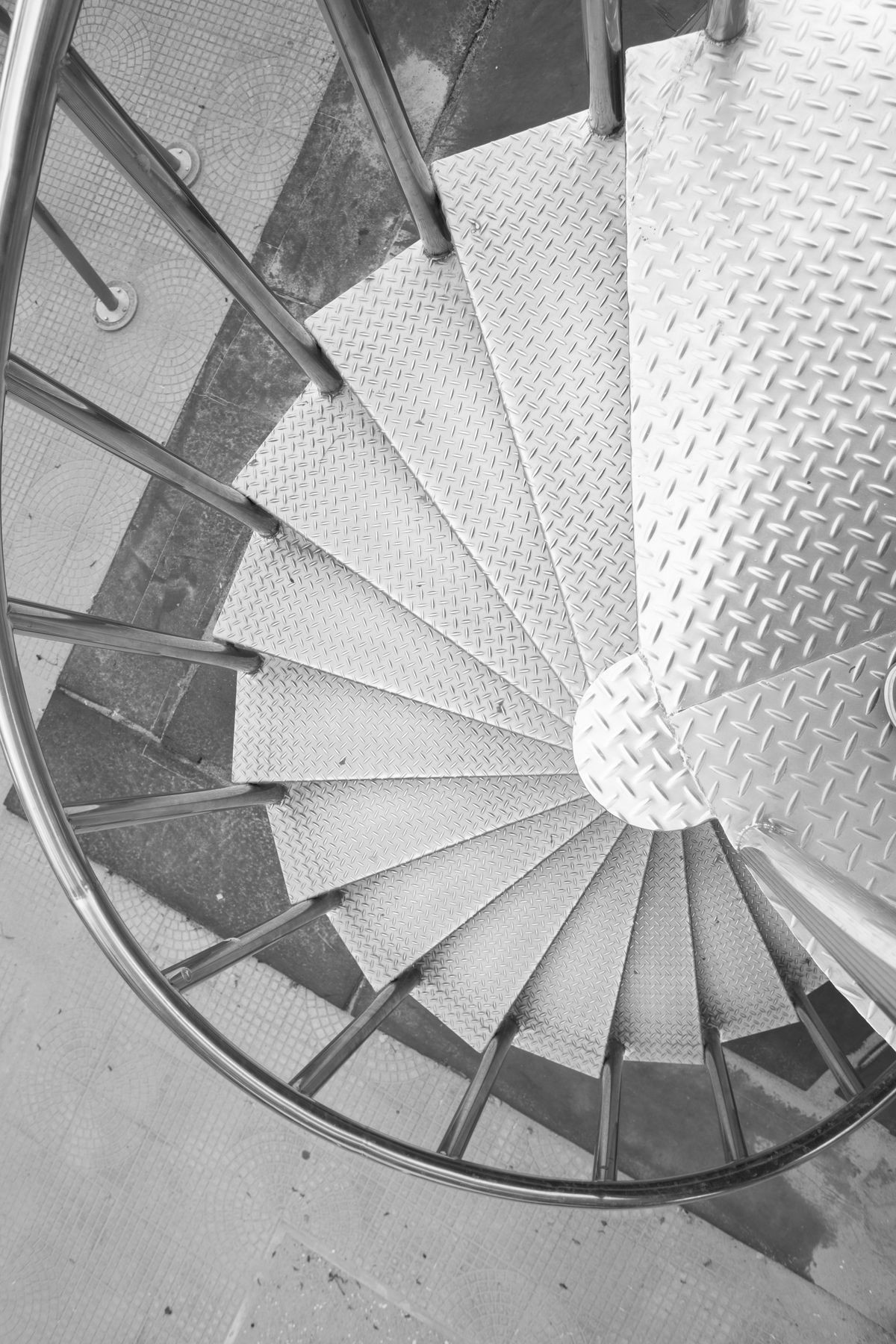 Spiral staircase with steel diamond plate, Pattern as Nautilus shell.